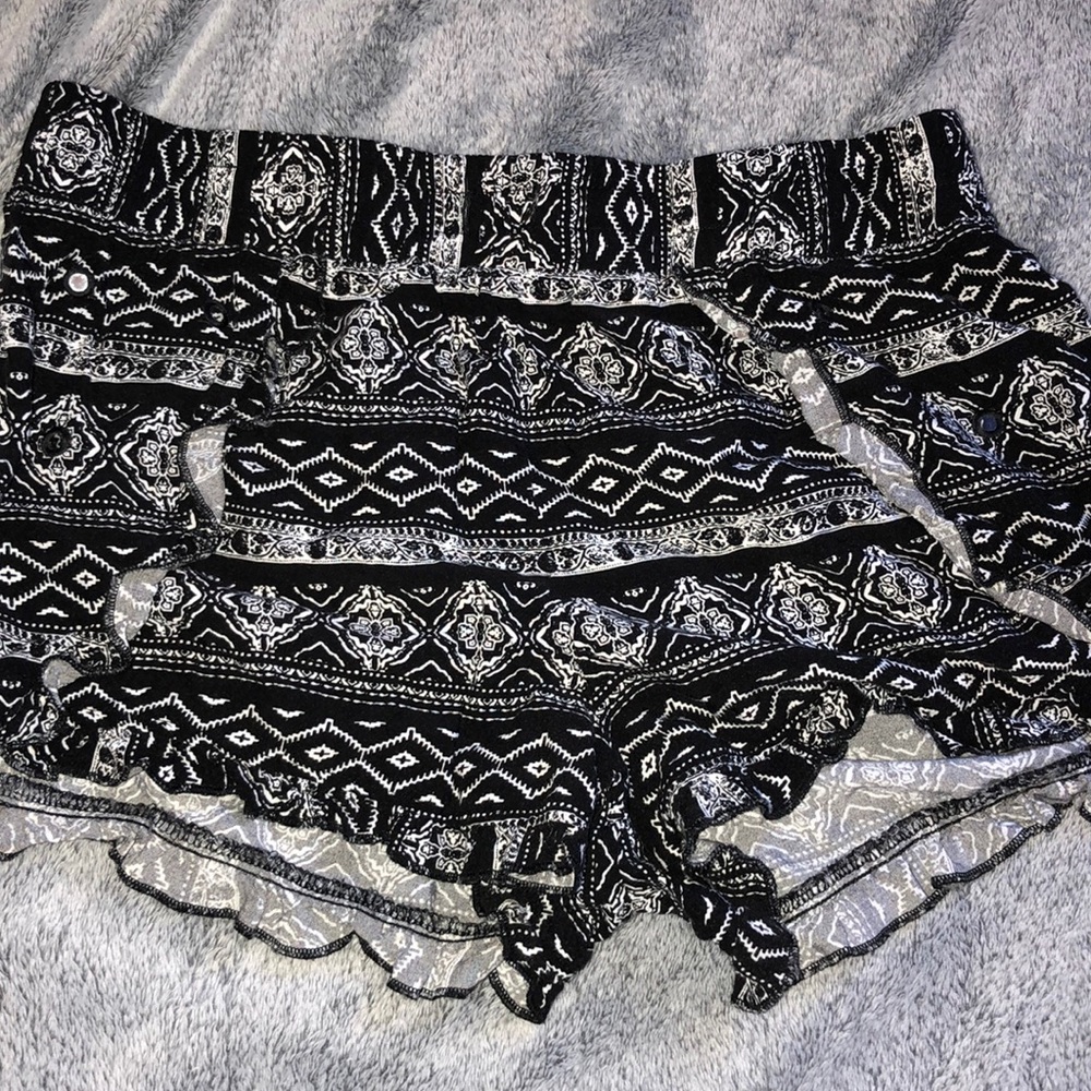 flowy, black shorts with white designs